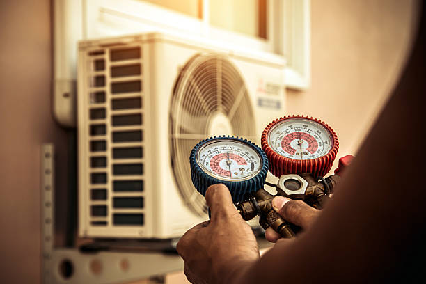 Professional Heat Pump Repair technician working in Porter Corners, NY